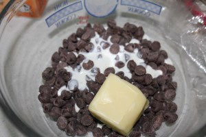 Nuke chips, butter and cream in 20-30 second bursts until chips are melted. Mix well.