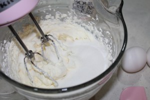 Add sugar and salt, blending well.