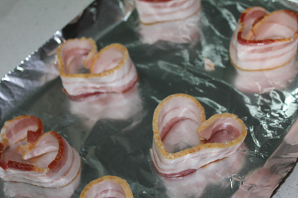 Line a baking sheet with foil. This will keep you from having to scrub bacon grease off the pan when you still aren't sure you are completely awake. Go ahead and preheat your oven to 425 degrees.