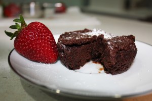 You can pour a glaze over the top, lavish on a ganache, dust with powdered sugar and accent with berries or whipped  cream.