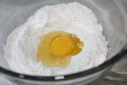 Make a well in your bowl of flour (after mixing in the salt) and stir in eggs and oil.