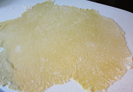 This is where the muscle comes in. You want to roll out that dough until is pretty thin and light. At least it gives you a great arm and upper body workout!