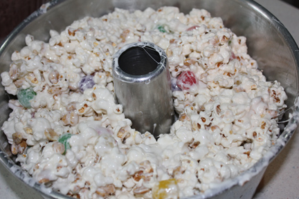 Press down into the angel food cake pan and let sit about thirty minutes or so before turning out on a serving platter.