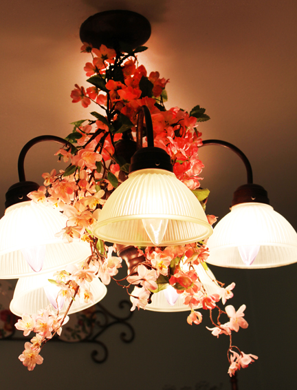 And I risked life and limb entwining dogwood branches around the chandelier. I loved how it looked when I finished. One of the guests called it whimsical. I had to agree. In fact, I wish I'd left the branches up there.