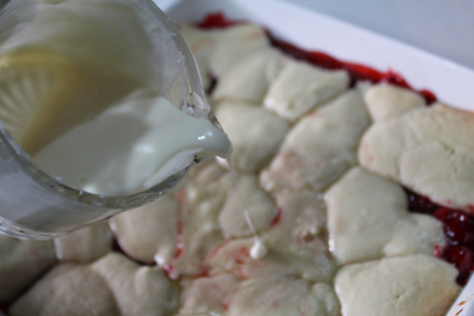 Then when the bars and done and still hot, pour glaze over the top.