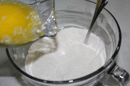 Combine dry ingredients then stir in melted butter.