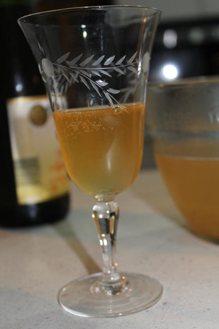 Pour syrup into a champagne flute (isn't this vintage one pretty?) then add sparking peach juice.