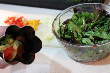 After you toss the lettuce with dressing, start layering it with the veggies. I think my layers went something like lettuce, tomatoes, cucumber, beets, olives, then repeat.