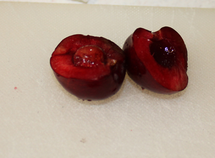 Start by pitting your cherries.