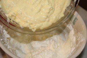Divide the whipping cream in half and add pudding mixture to one half.