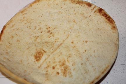Toast your Pita bread - just until it's warm.