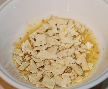 Stir together until cracker crumbs are well coated.