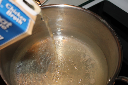 When the meat is almost done, add water and broth to your stock pot.
