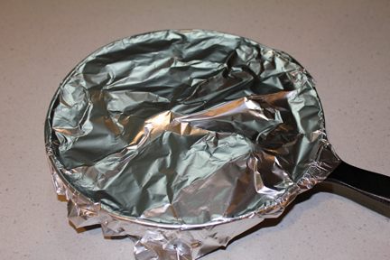 Cover with foil and bake in a 350 degree oven for 2 1/2 hours.