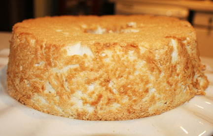 Run a knife around inside of pan to loosen edges then insert onto a serving platter or cake plate.