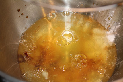 Once egg whites are up to temp, mix with vanilla and cream of tartar until soft peaks form.